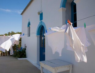 Clothing On A Clothes Line At Kioni Church; Ithaki, Greece