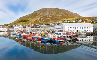 Tuinposter Idyllic fishing harbor and town Honningsvåg above the arctic circle near the North Cape in Norway © Photofex