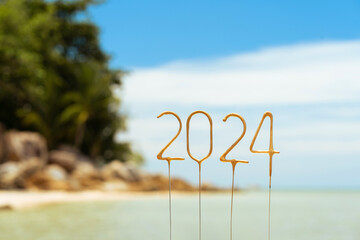 Numbers 2024 for the upcoming New Year on a tropical beach in bright sunny weather, concept of...