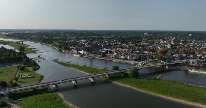 Deventer city view, aerial drone view on the skyline of Deventer. Gelderland, The Netherlands. City infrastructure, Ijssel river, boulevard and city overview.