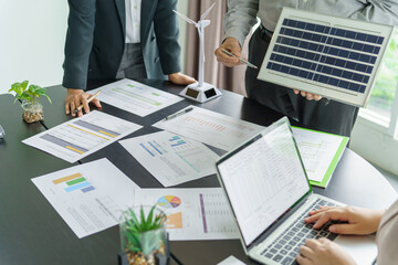 Solar panels green energy Business people working in green eco friendly office business meeting creative ideas for business eco friendly professional teaching corporate people sustainable electricity - obrazy, fototapety, plakaty