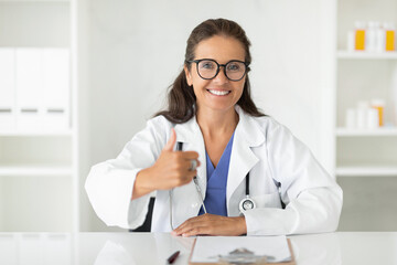 Portrait of happy beautiful Caucasian mature woman doctor