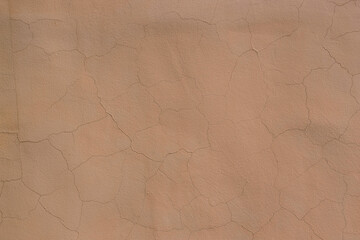 Fototapeta premium Plastered wall surface with cracks