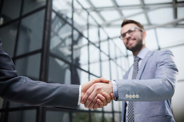 business partners shaking hands . concept of partnership