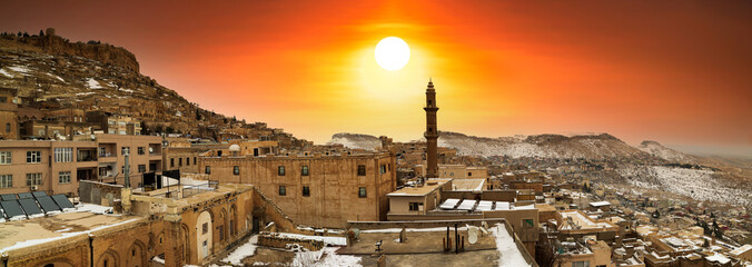 Winter season.  Sunrise in the old city of Mardin.  Historical and cultural travel destination in...