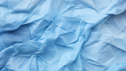 Fototapeta premium Light blue crumpled paper texture background