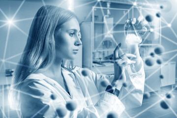 Woman scientist. Girl laboratory assistant with test tube. Student of faculty of science. Bio...