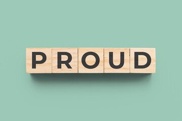 Proud wooden cubes on blue green background