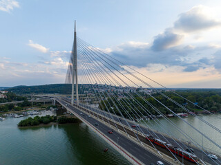 Fototapeta na wymiar View of Ada Ciganlija from aerial drone and Most na Adi bridge over Sava River.