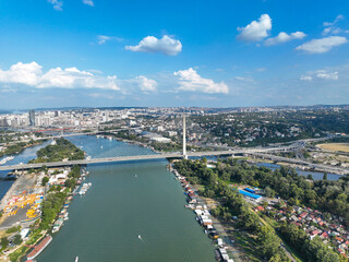 View of Ada Ciganlija from aerial drone and Most na Adi bridge over Sava River. Belgrade - Serbia