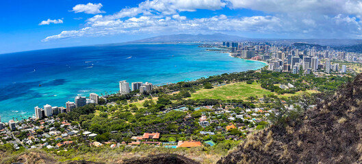 Hiking the Diamond Head Volcano Trail in Honolulu, Hawaii, looking  down at Waikiki, Hawaii from...