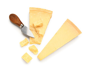 Pieces of tasty Parmesan cheese with knife on white background