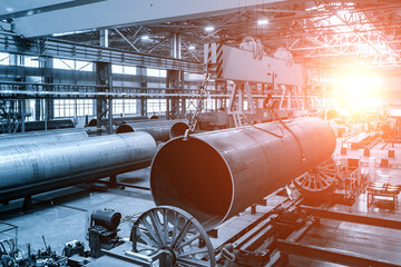 Finished pipe transportation by overhead crane in pipe factory