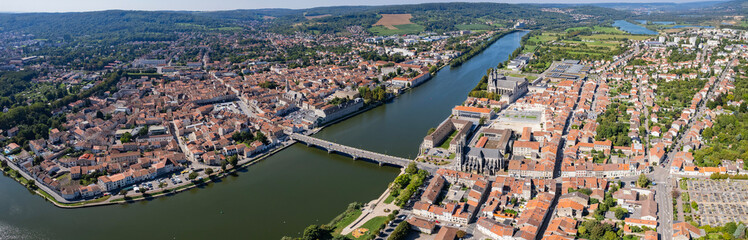 Aerial of the old town around the city Pont-a-Mousson in France on a sunny day in late summer.

