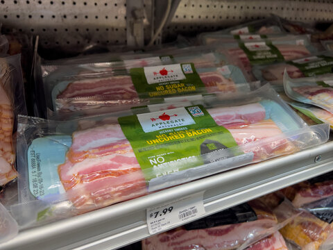 Mill Creek, WA USA - circa June 2023: Close up view of Applegate uncured bacon for sale inside a Town and Country grocery store.