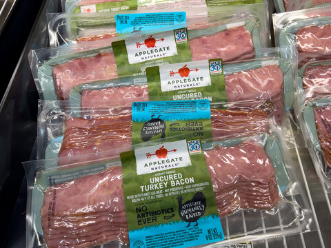 Mill Creek, WA USA - circa June 2023: Close up view of Applegate uncured bacon for sale inside a Town and Country grocery store.