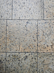 Interesting abstract patterns on old floor tiles, Lodz, Poland.