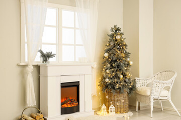 Interior of festive living room with fireplace and Christmas tree near window