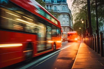 Rolgordijnen Shot of London double decker red bus fast driving with blurry city in the background © VisualProduction