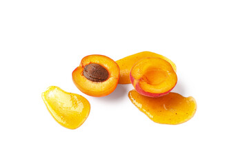 Sweet apricot and smear of jam on white background
