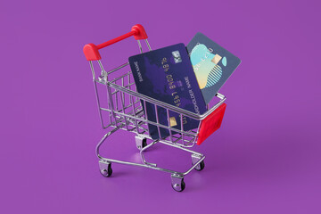 Shopping cart and credit cards on purple background