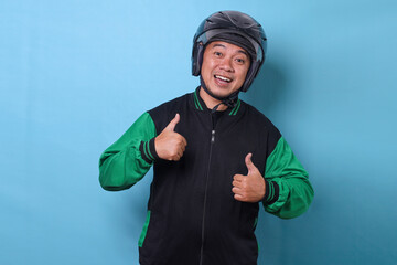 Excited Asian delivery man wearing helmet and  jacket showing two thumbs up