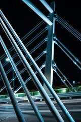 modern metal cable bridge Kaczorowskiego at night, abstract geometry, Lubln