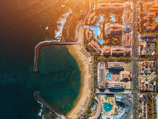 ocean bay with blue water, coast line with hotels and resorts, Tenerife, Canary