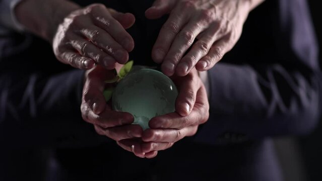 Glass Earth globe ib the hand. Ai generated