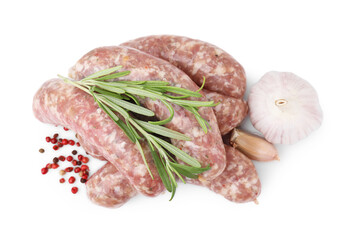 Raw homemade sausages and different spices isolated on white, top view
