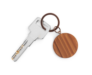 Key with wooden keychain isolated on white, top view
