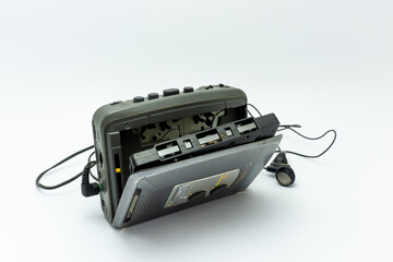Vintage audio player. Old fashioned portable cassette player, cult object, icon and symbol of the...