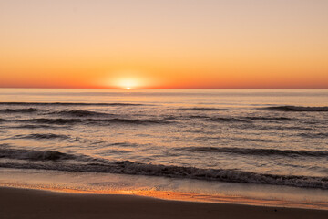 Sunrise over the Atlantic Ocean from the beach on Pawleys Island South Carolina