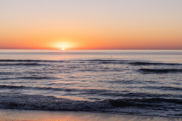 Sunrise over the Atlantic Ocean from the beach on Pawleys Island South Carolina