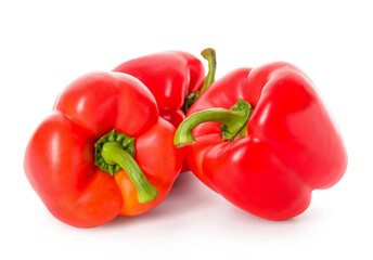 Fresh red bell peppers isolated on white background