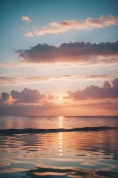 Beautiful sunset over the sea with clouds reflected in the water.