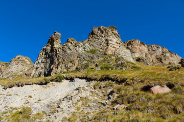 Fototapeta na wymiar Granit rocks and Mountains in Elbrus region, the highest mountain in Europe