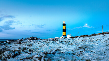 lighthouse in the snow