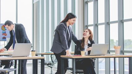 Asian professional successful female businesswoman supervisor mentor in formal suit standing...