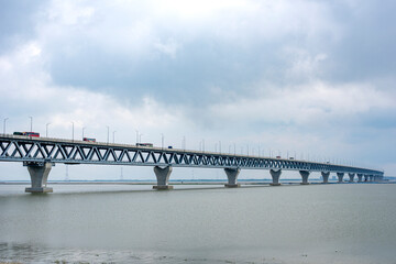 View of Padma Bridge, The Padma Multipurpose Bridge commonly known as the Padma Bridge is a two-level road-rail bridge across the Padma River