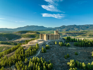 Aerial view of Davalillo castle above the Ebro river in Rioja Spain, with semicircular towers and...