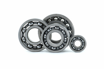 Set of various ball bearings isolated over white