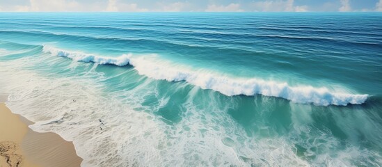 Beach view from above with ocean and waves