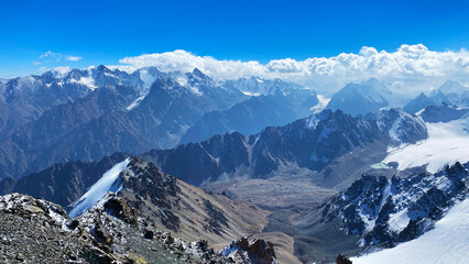 Amazing view from the top of Mount Adygine. Ala-Archa National Park, Kyrgyzstan. Snow-capped...