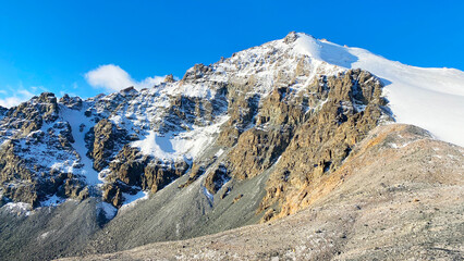 Beautiful mountain landscape. Ala-Archa National Park, Kyrgyzstan. Snow-covered ridges, rocks,...
