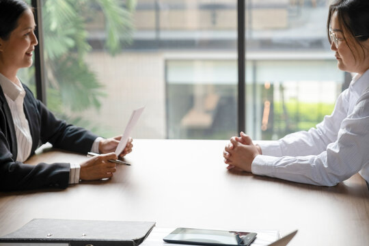 Woman having interview with recruiter.
