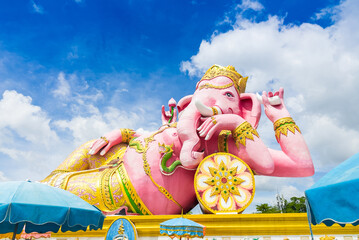 Pink ganesha statue in the bluesky at Wat Samarn, Chachoengsao, Thailand
