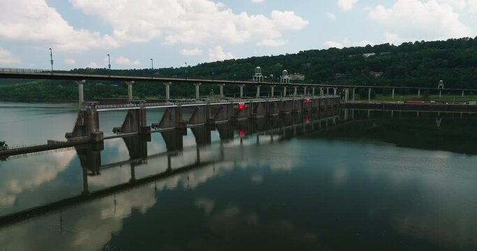 Big Dam Bridge With Perfect Mirrored Reflections On Water In Little Rock, Arkansas. lateral