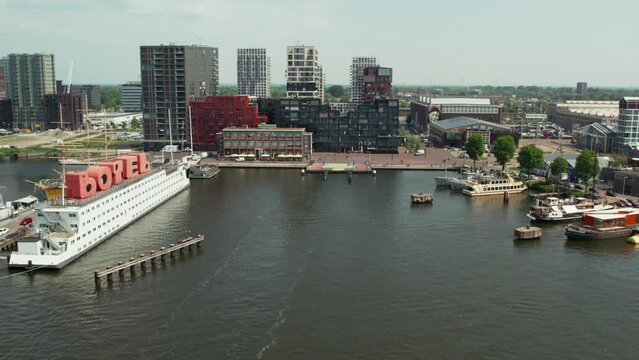 NEXT Restaurant And Botel Near NDSM Ferry Terminal In Amsterdam, Netherlands. wide aerial