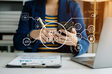 Zero trust security concept Person using computer and tablet with zero trust icon on virtual screen...